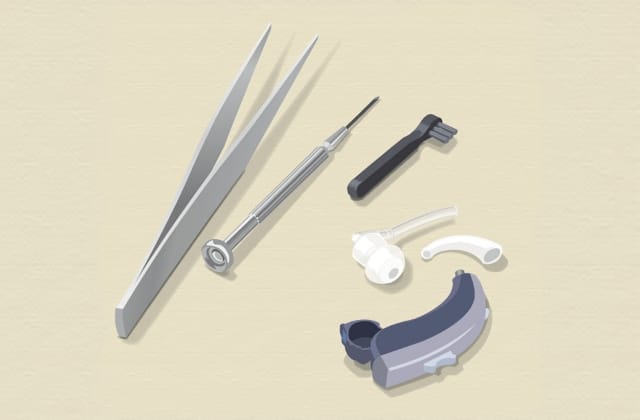 イラスト:ピンセットやブラシ等の器具と、補聴器